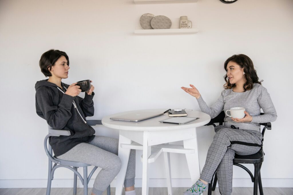 Two women having a conversation.